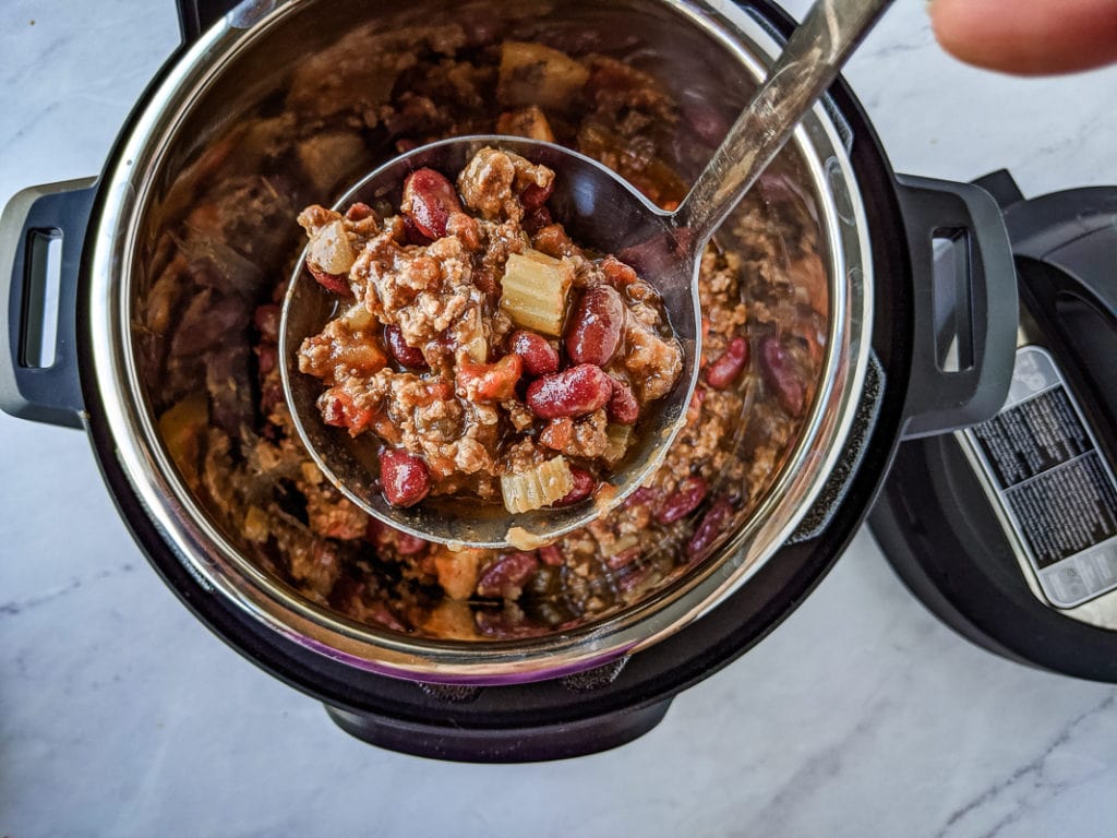 ladle of pineapple chili in Instant pot