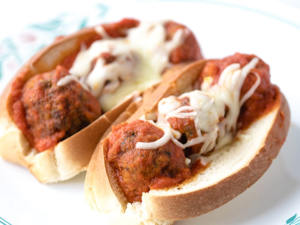 sub made with air fryer meatballs, sauce and cheese