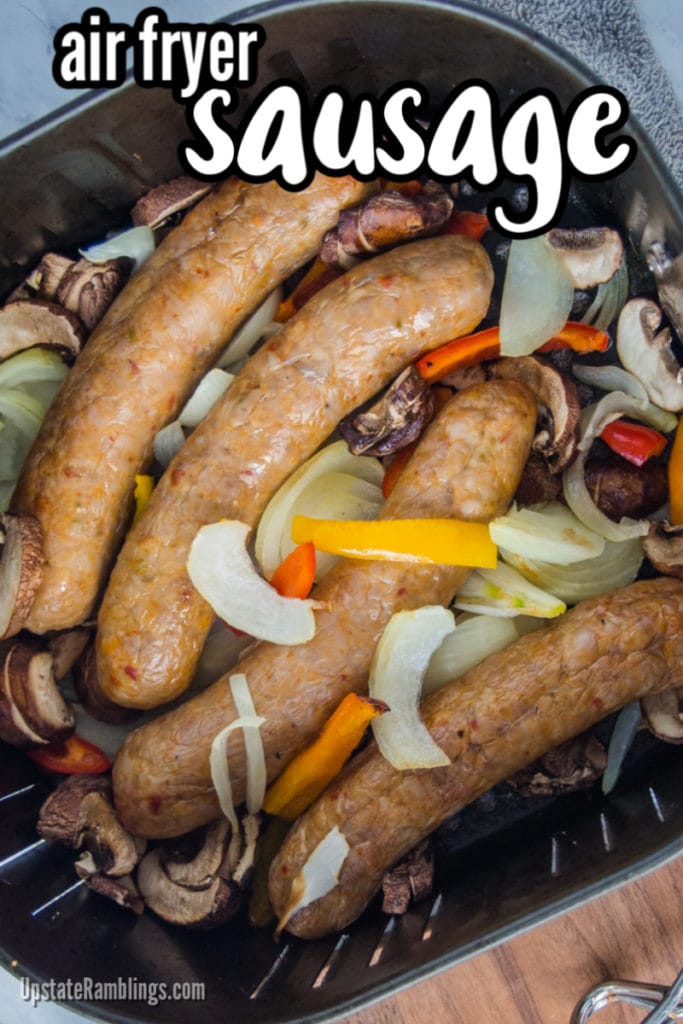 Italian sausage and vegetables in an air fryer basket