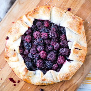 top view of blackberry galette on a cutting board