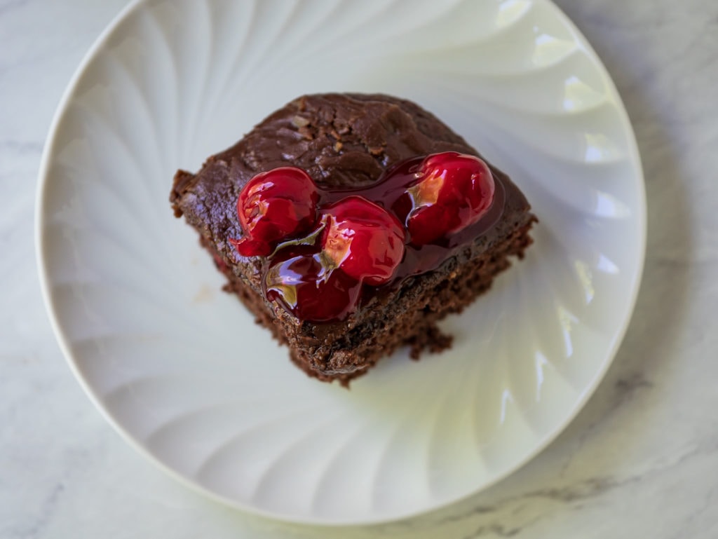 top view of chocolate cake with cherries
