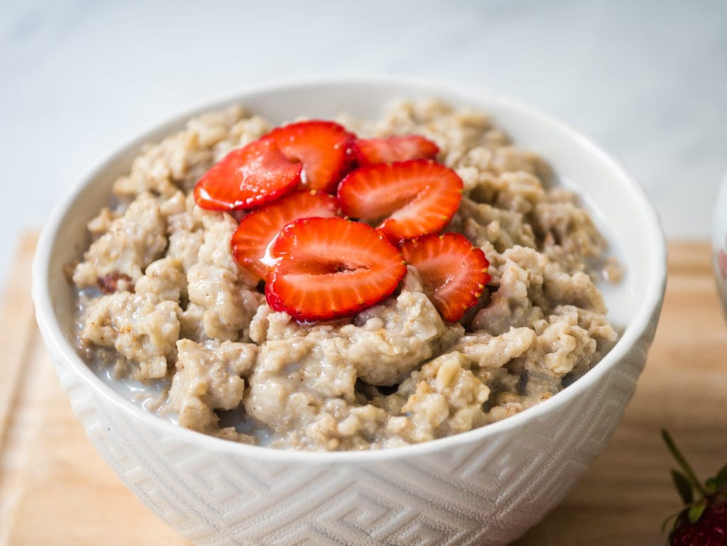 oatmeal topped off with strawberries