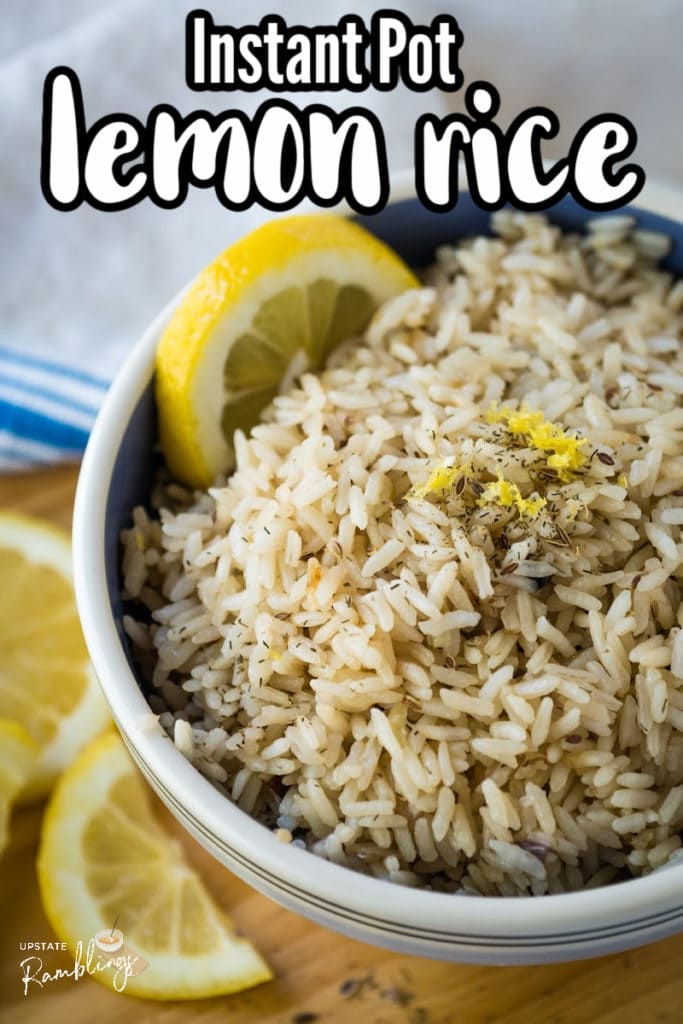 bowl of lemon rice with lemon slices to garnish