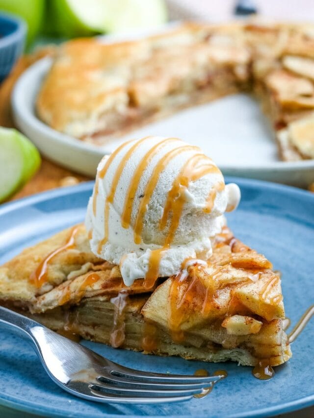 close up of a slice of an apple galette
