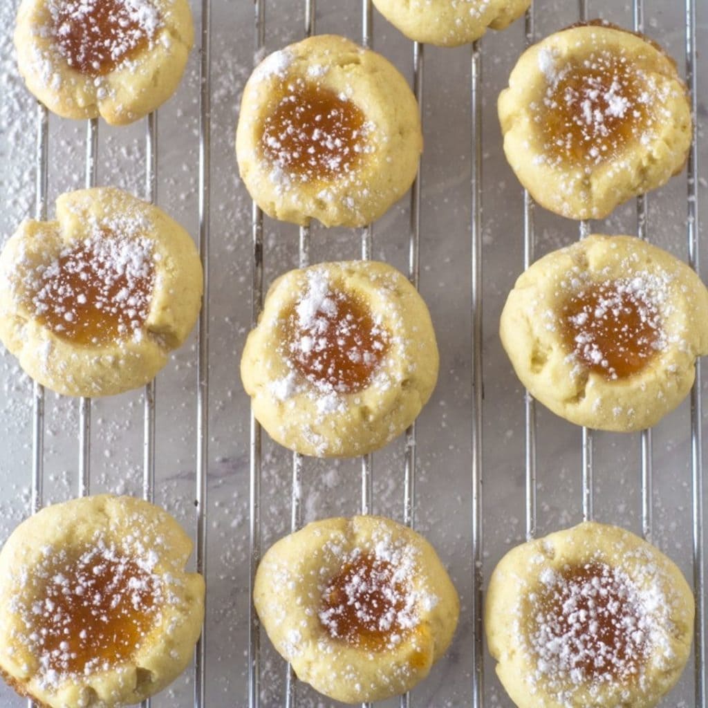 top view of thumbprint cookies on a wire rack