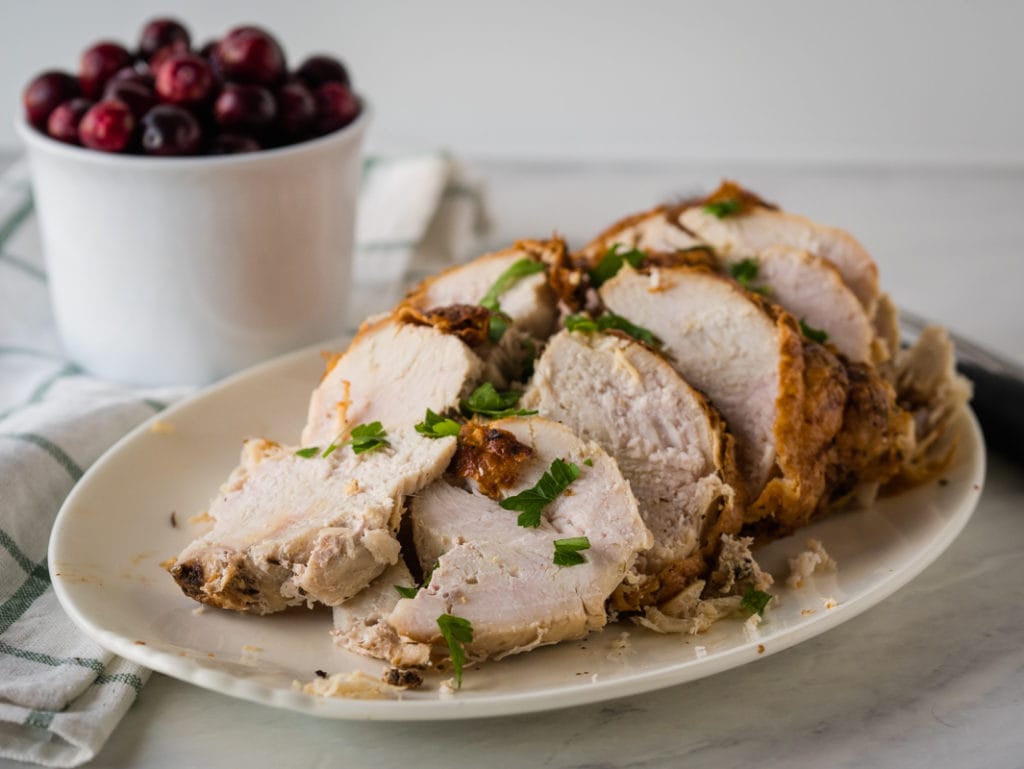 turkey breast sliced on a platter