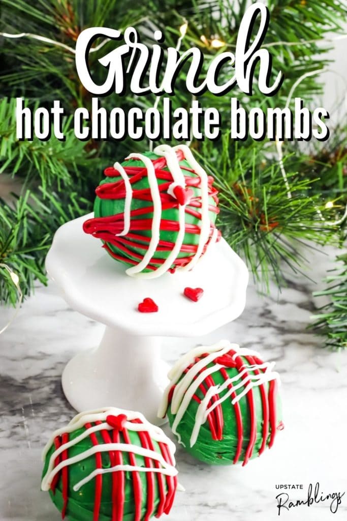 hot chocolate bombs in front of a Christmas tree