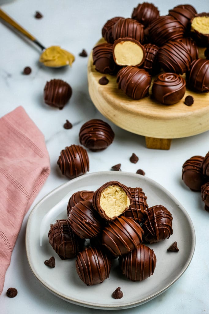 two stacks of chocolate peanut butter balls
