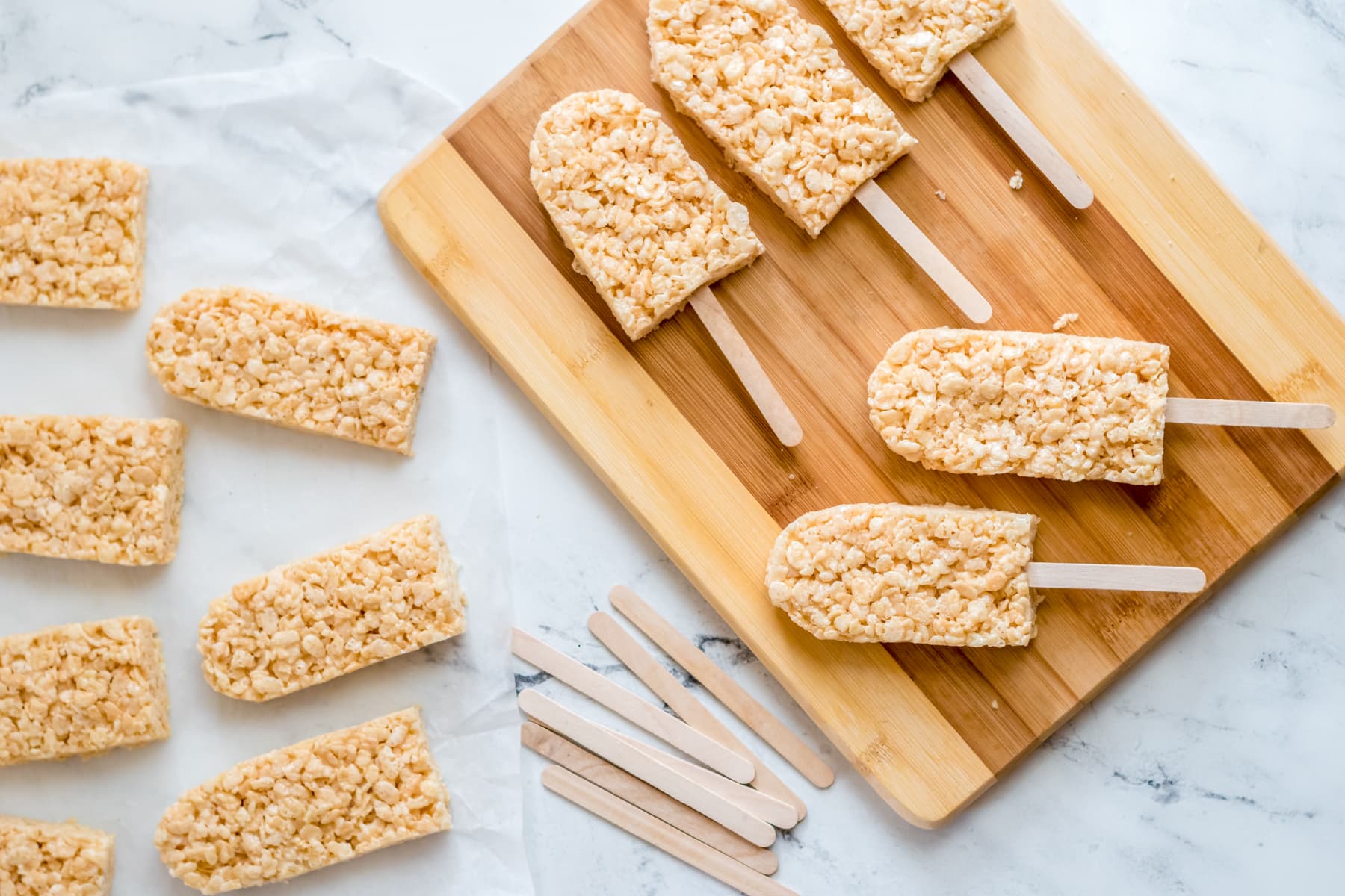 White Chocolate Dipped Rice Krispie Treats on a Stick - Domestically  Speaking