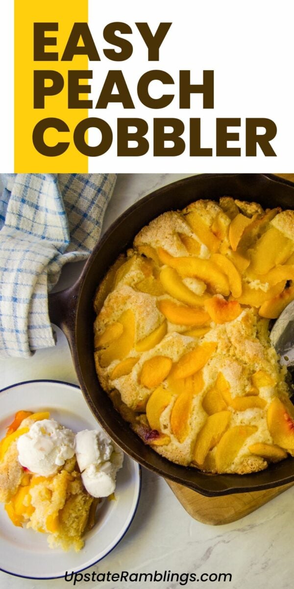 Iron skillet filled with peach cobbler beside a plate with a serving of cobbler topped with vanilla ice cream. A blue-striped cloth is draped on the side. Text at the top reads "Lazy Day Peach Cobbler.