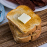 stack of air fryer toast with butter