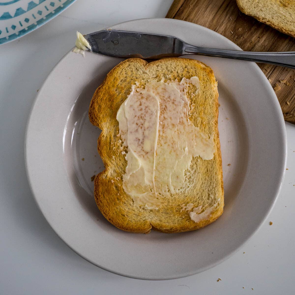 buttering toast