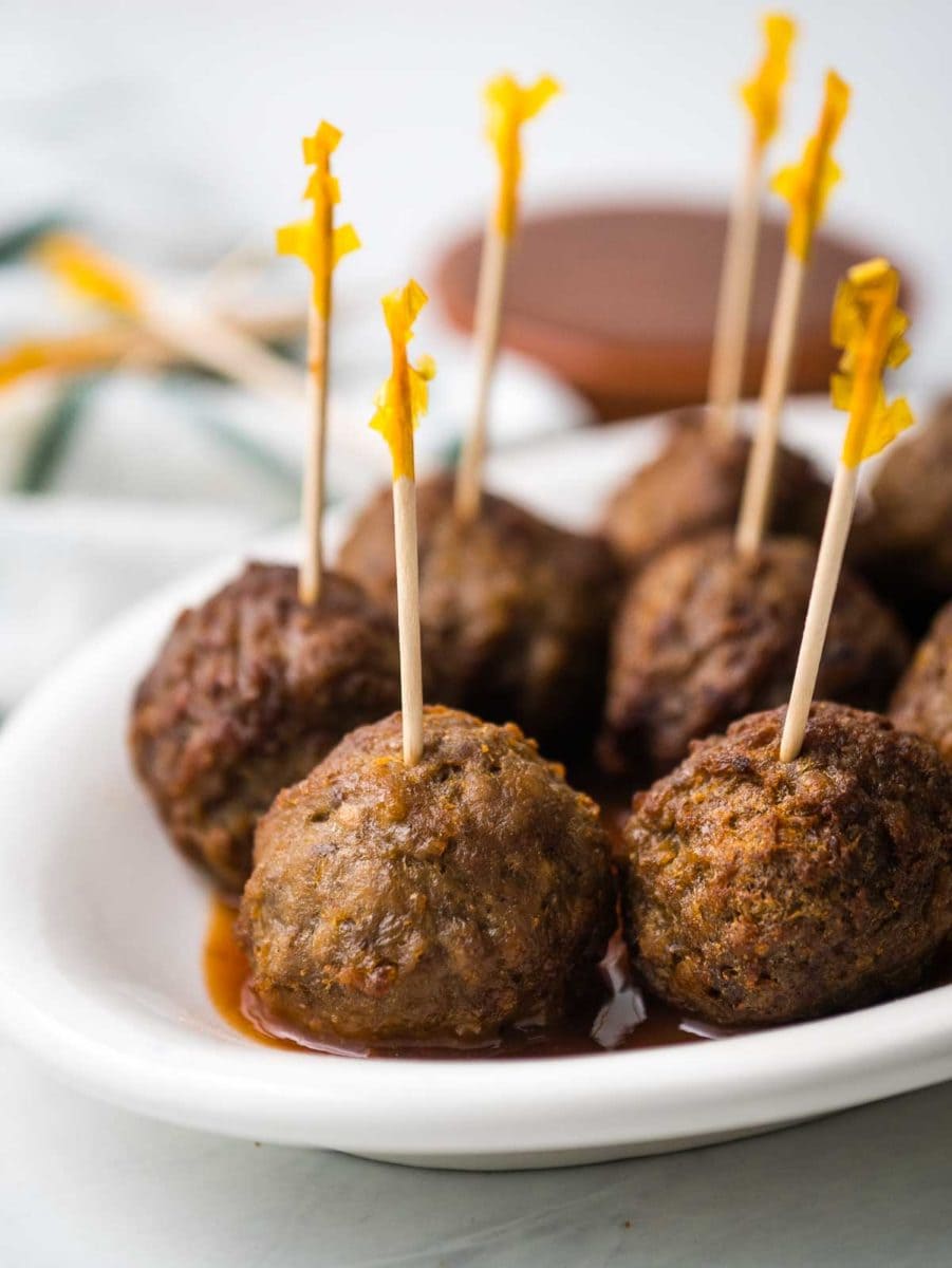 meatballs in barbecue sauce with toothpicks