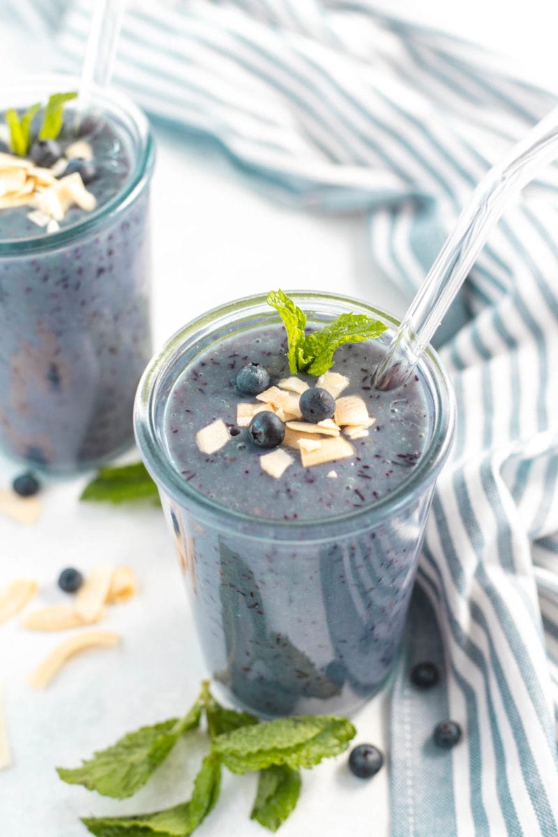 smoothie with mint leaves and coconut flakes