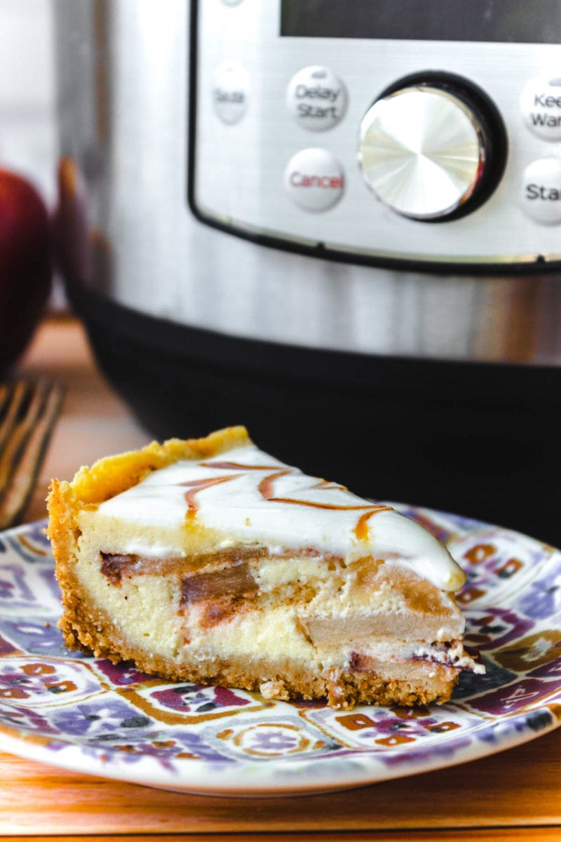 slice of apple pie cheesecake with pressure cooker