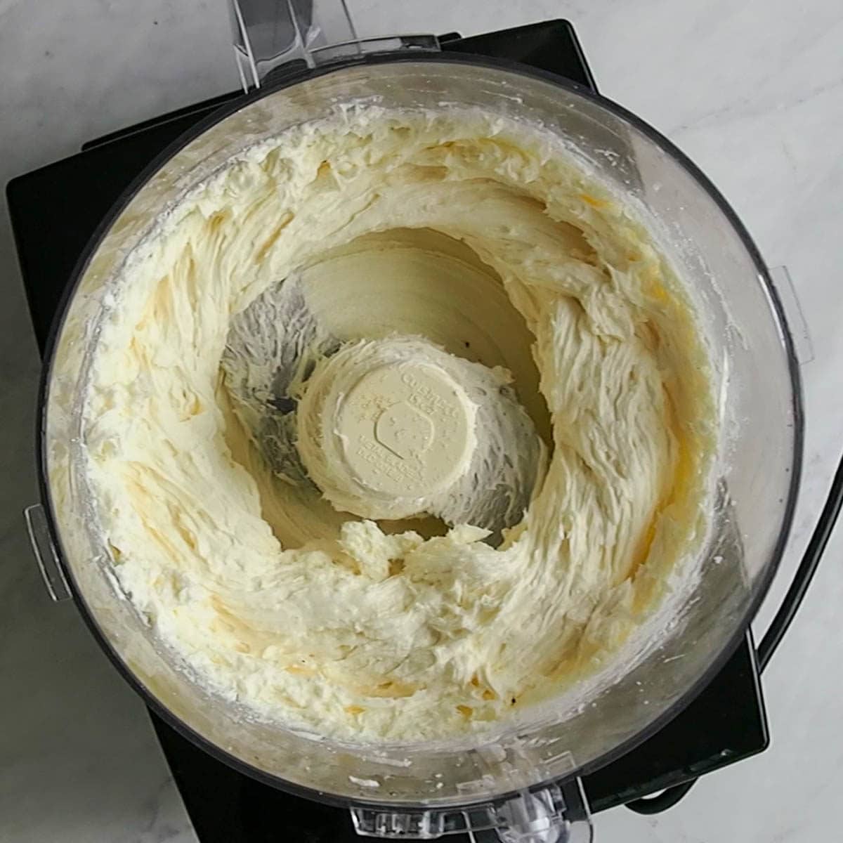 mixing the cream cheese and sugar