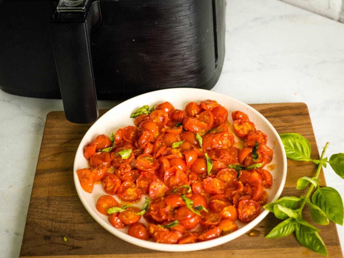 roasted tomatoes in front of air fryer