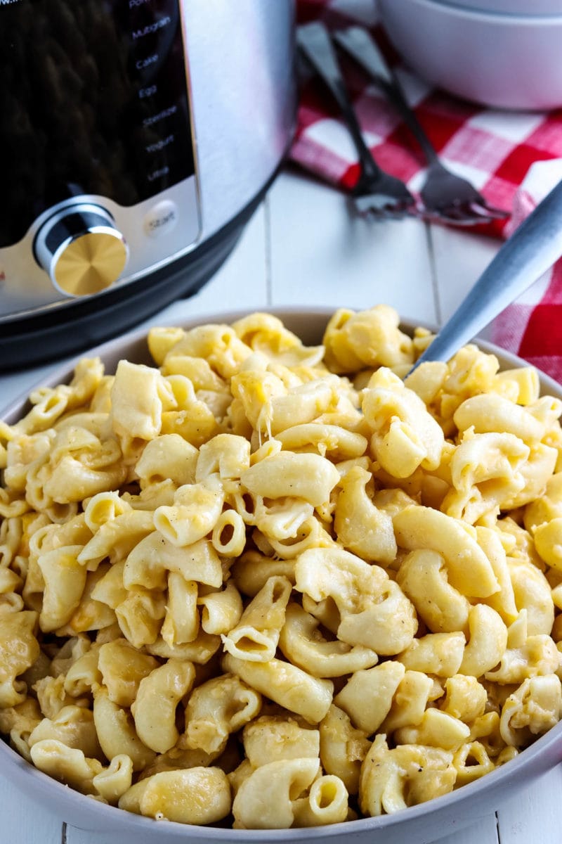 bowl of 5 ingredient mac and cheese in front of instant pot