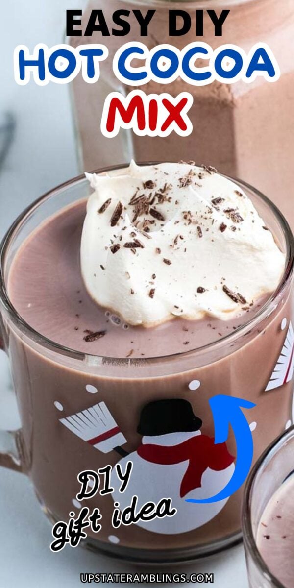 A glass mug of hot cocoa topped with whipped cream and chocolate shavings; text reads "Easy DIY Hot Cocoa Mix" and "DIY gift idea." Perfect for gifting, this homemade hot chocolate mix is simple and delicious.