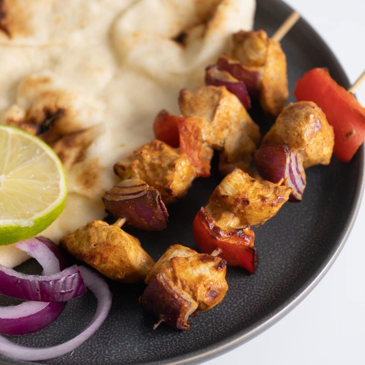 chicken kebabs on a plate