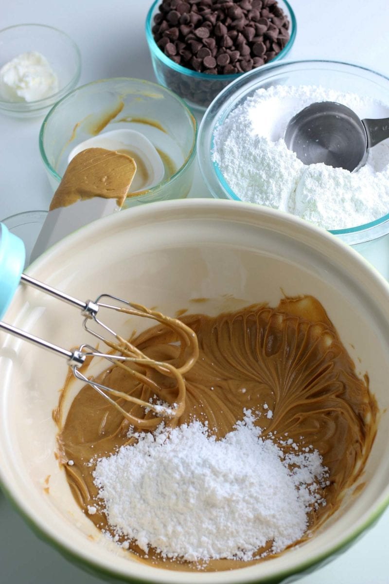 mixing peanut butter and powdered sugar