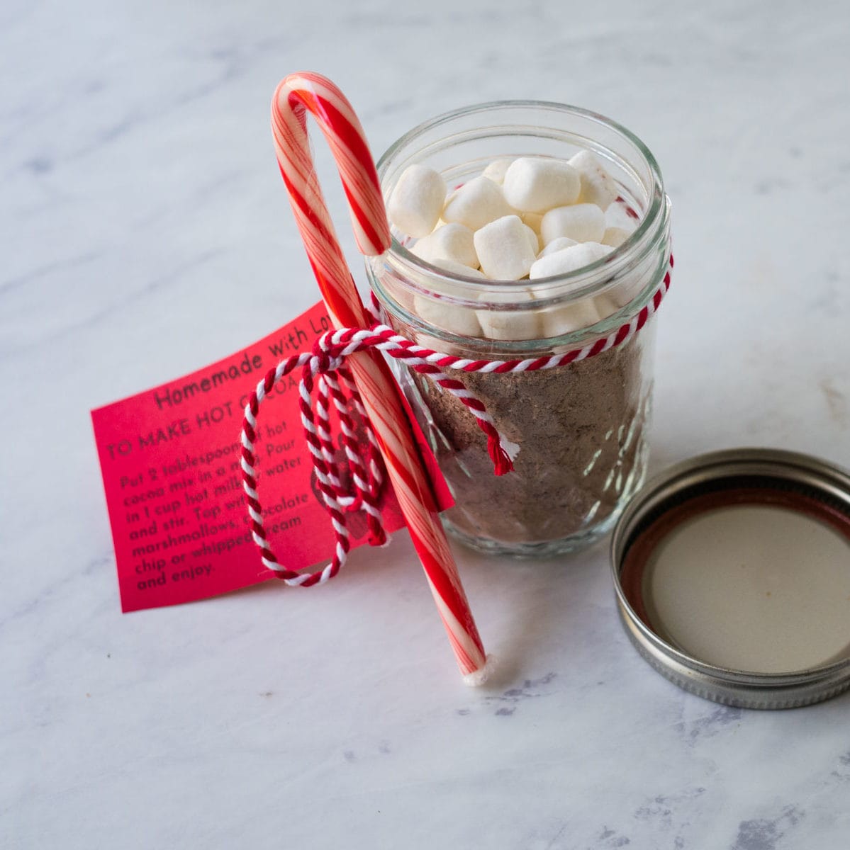 gift jar of cocoa mix with gift tag