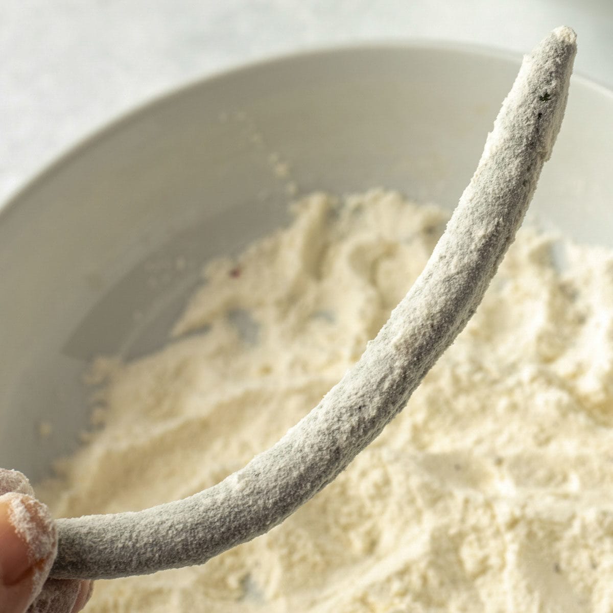 dipping bean in flour