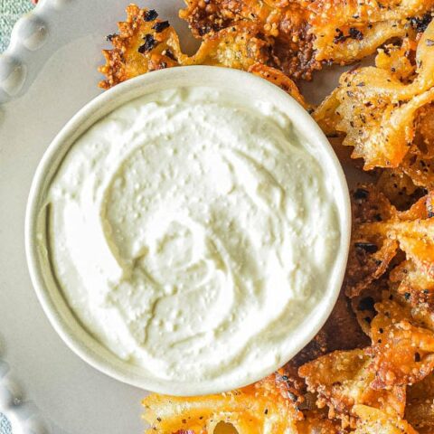 top view of whipped feta and pasta chips