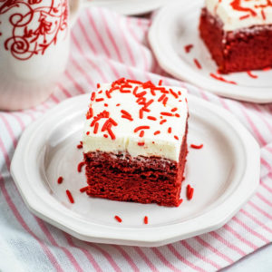 red velvet brownies on a plate with coffee