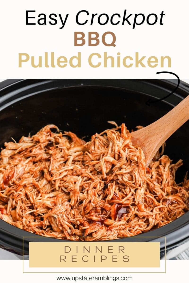 Crockpot filled with slow cooker pulled chicken in tangy BBQ sauce, being stirred with a wooden spoon. Text overlay reads "Easy Crockpot BBQ Pulled Chicken" and "Dinner Recipes.