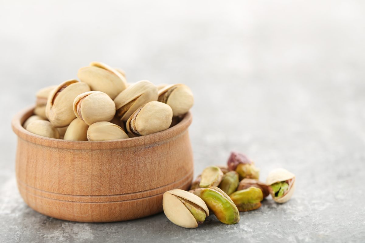 wooden bowl with pistachios
