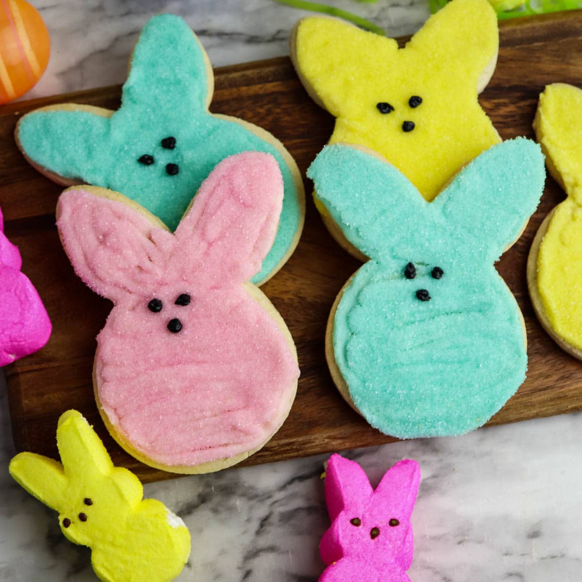 Bunny sugar cookies decorated with sanding sugar to look like peeps.