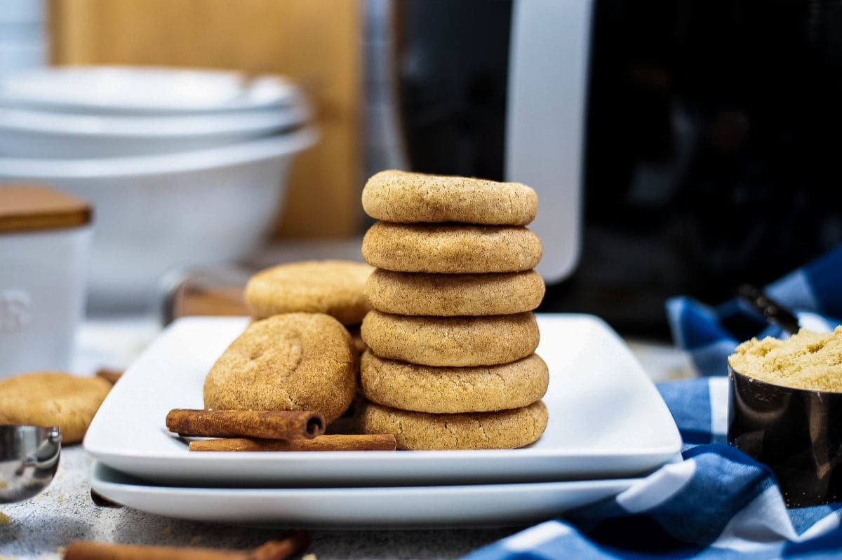stack of snickerdoodles in front of air fryer