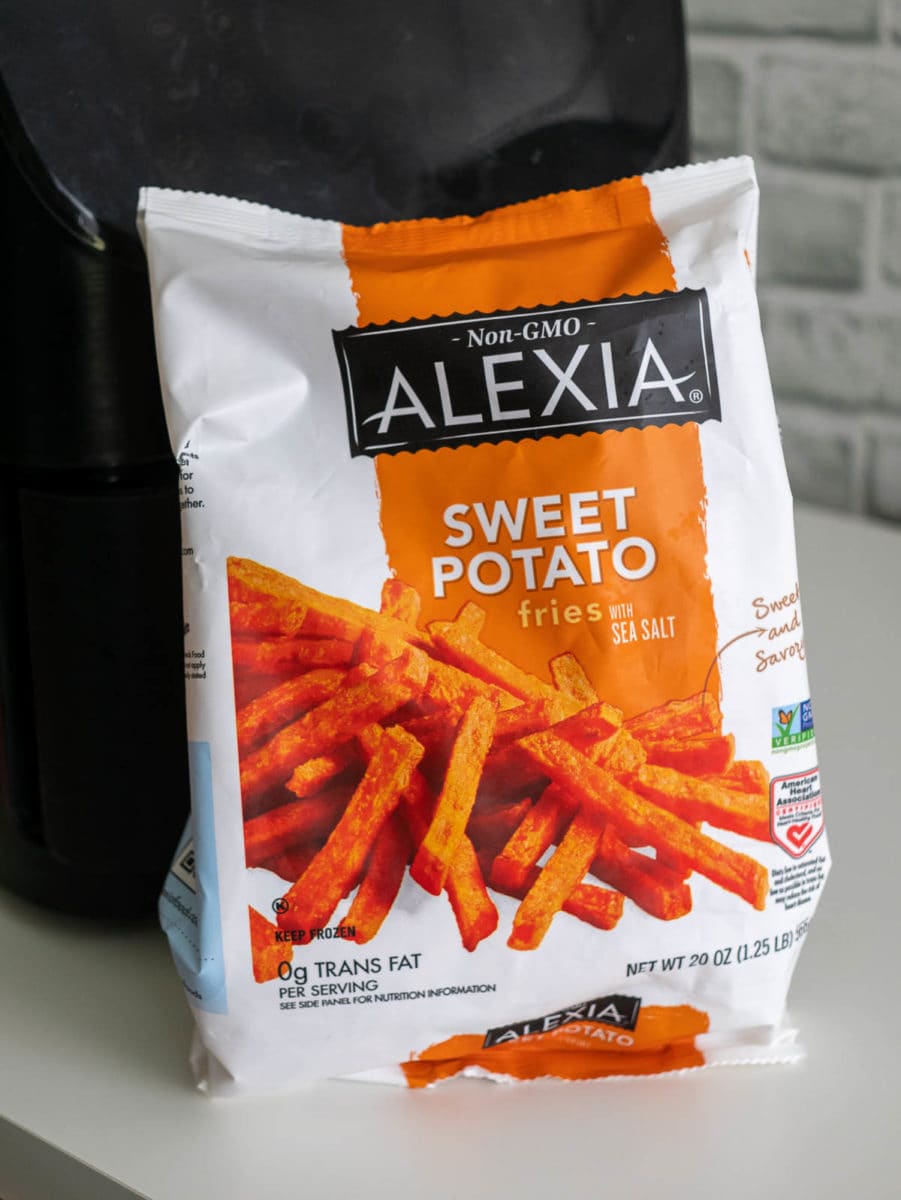bag of fries in front of air fryer
