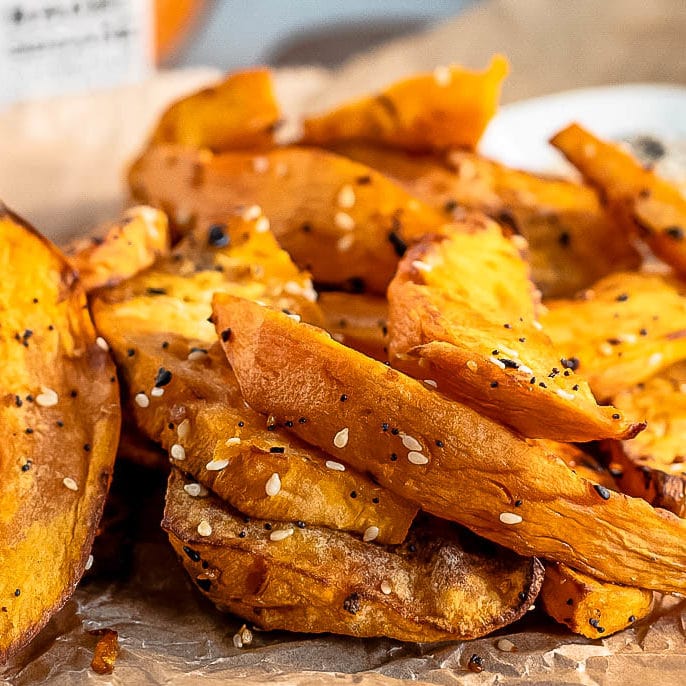 Air fried sweet potato wedges on parchment.