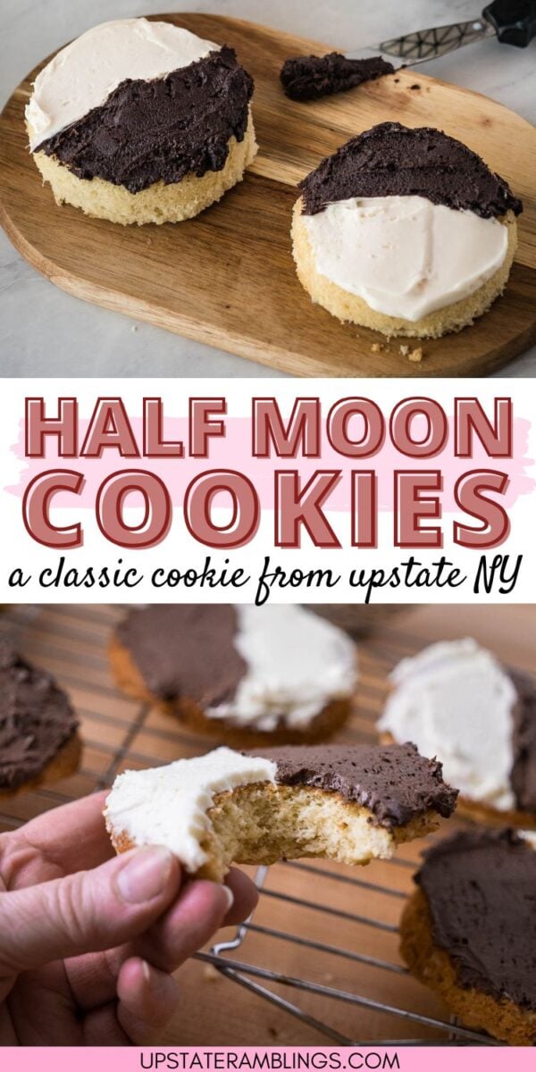 Two half moon cookies, one topped with chocolate and vanilla icing, rest on a cutting board. A hand holds a bitten half moon cookie, while more cookies cool on a rack in the background.