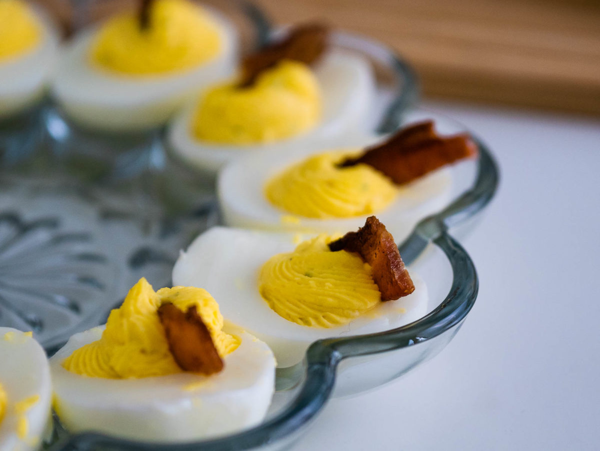 ranch deviled eggs in glass plate