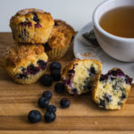 air fryer blueberry muffin broken open to show berries
