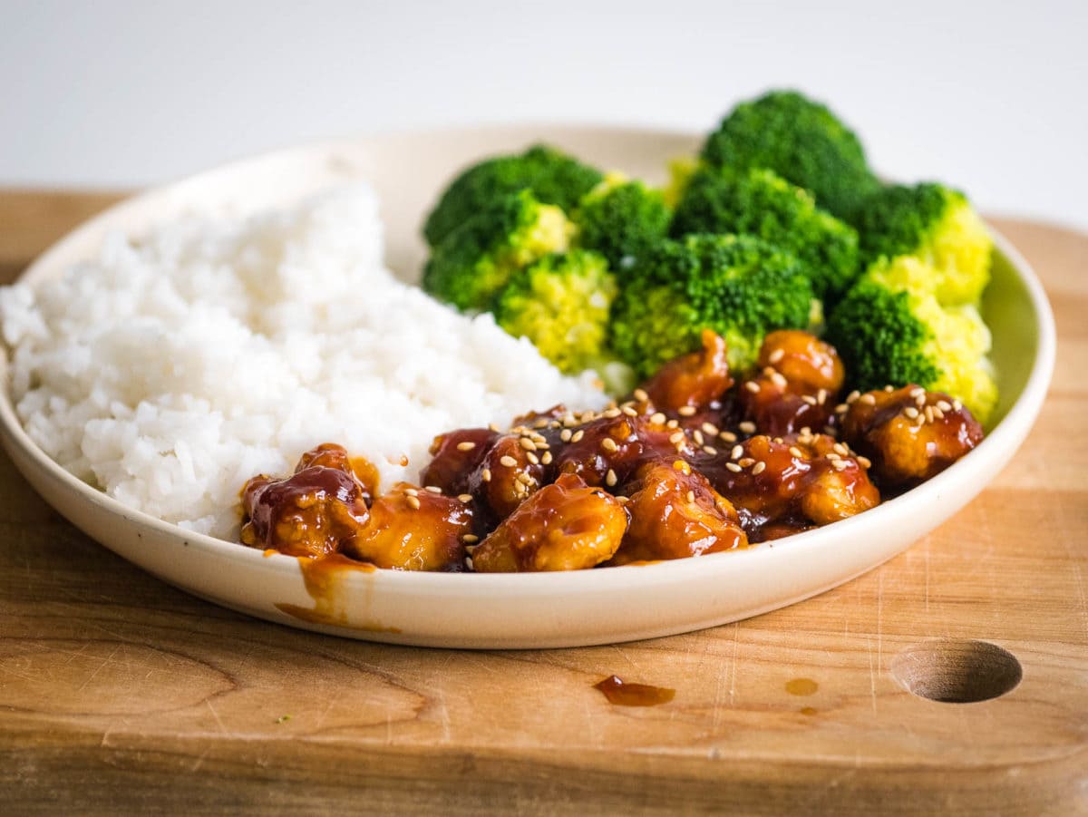plate with rice, broccoli and General Tso's chicken