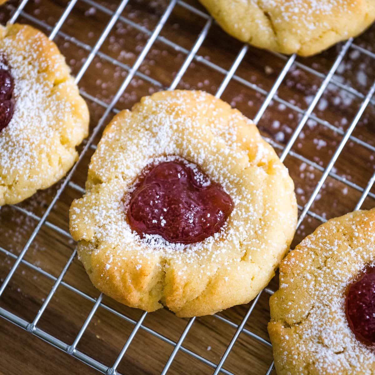 air fryer strawberry thumbprint cookie on a cooling rack