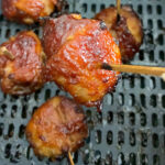 air fryer bacon wrapped water chestnut on a toothpick