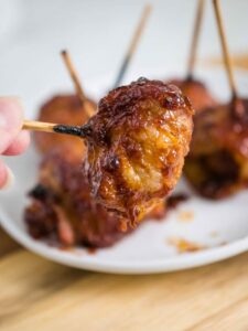 bacon wrapped water chestnut on a toothpick