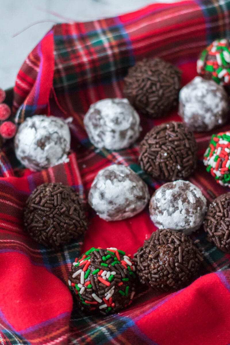 rum balls on a tray with plaid fabric.