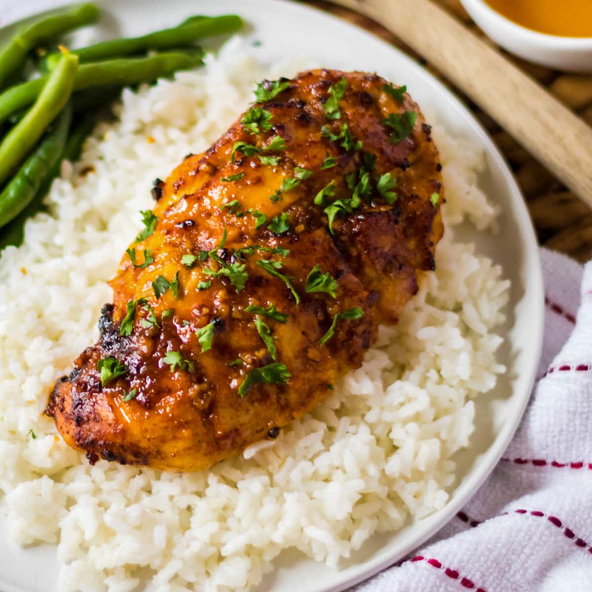 Hot honey chicken on a bed of rice.