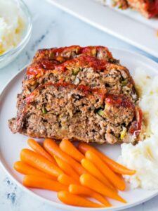 meatloaf with mashed potatoes and carrots.