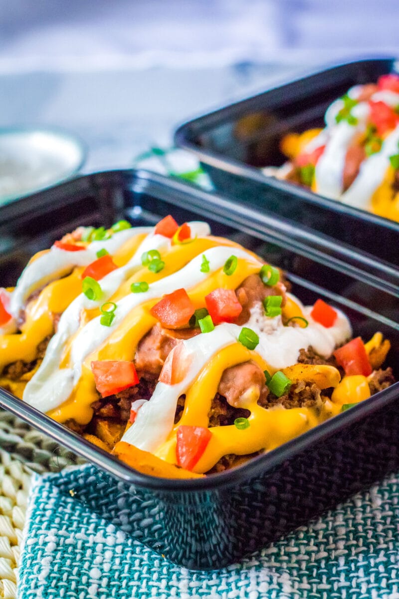 taco bell nacho fries supreme in takeout containers