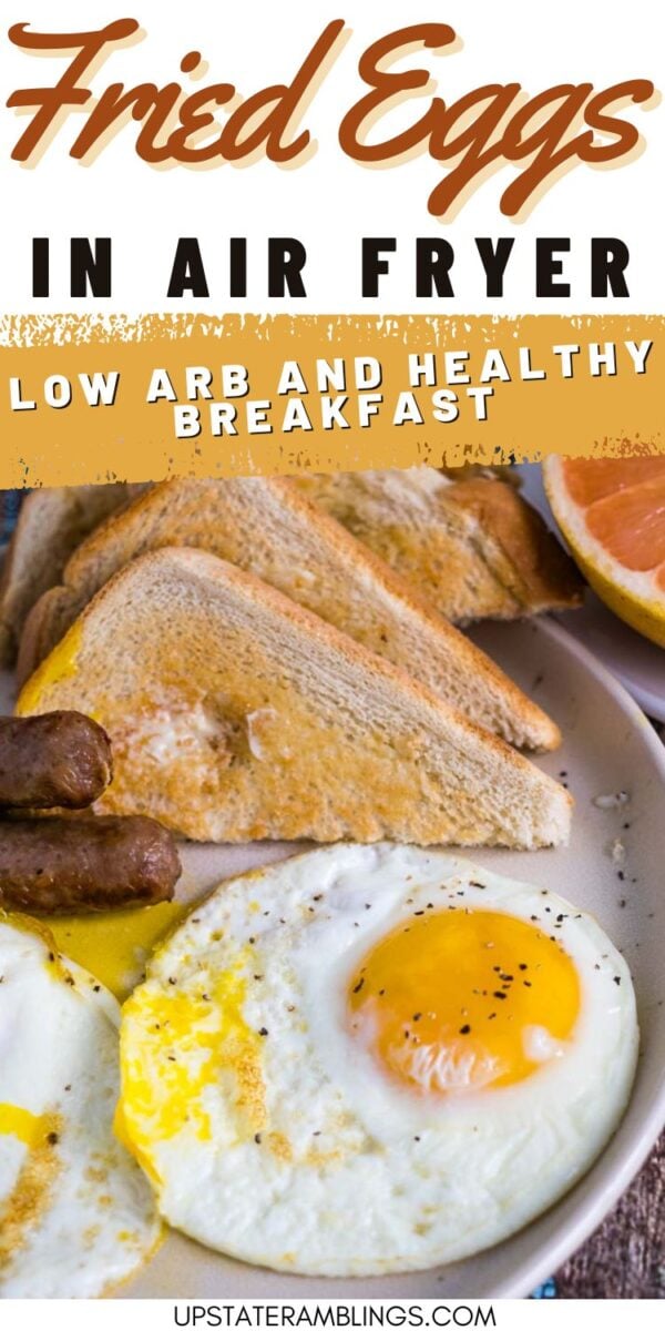 Plate with two fried eggs in air fryer, toasted bread slices, breakfast sausages, and half a grapefruit. Text reads "Fried Eggs in Air Fryer" and "Low Carb and Healthy Breakfast.