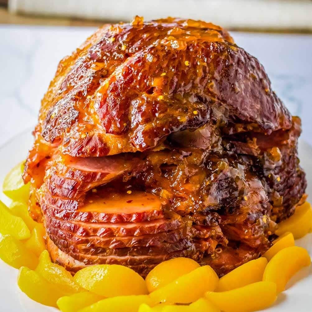 crock pot spiral ham with hot honey peach glaze for Easter.