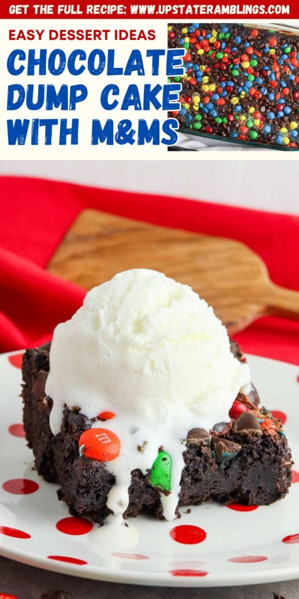 A slice of chocolate dump cake with M&Ms, topped with a scoop of vanilla ice cream, sits on a white plate paired with a red napkin.