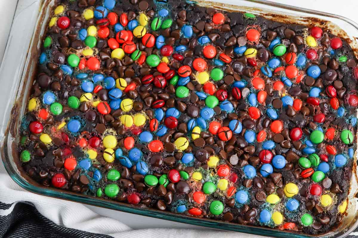Dump cake with M&Ms and chocolate chips added to the batter.